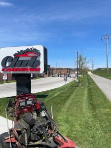 Grass near commercial spaces, part of Mobeck Lawn & Landscape's lawn mowing services in Central Illinois
