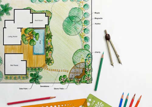 A team member at Mobeck Lawn & Landscape sketches out a Landscape Design in Washington IL