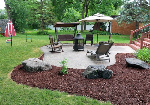 A beautifully designed back yard is one of the services Mobeck Lawn & Landscape offers in addition to Local Lawn Care in Peoria IL